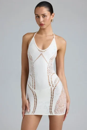 Tori Minikleid mit Verzierungen und Neckholder in Elfenbein