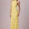 Tove Maxikleid mit Rüschen, rückenfreiem Ausschnitt und Neckholder in Zitronengelb Tove Maxikleid mit Rüschen, rückenfreiem Ausschnitt und Neckholder in Zitronengelb