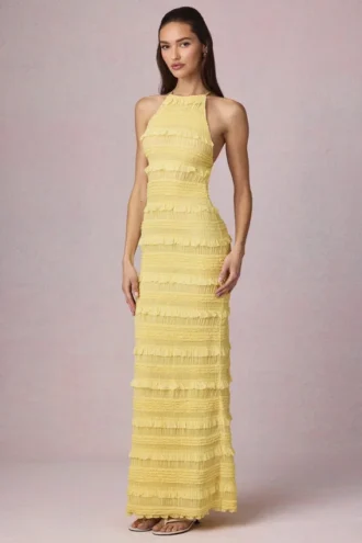 Tove Maxikleid mit Rüschen, rückenfreiem Ausschnitt und Neckholder in Zitronengelb