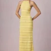 Tove Maxikleid mit Rüschen, rückenfreiem Ausschnitt und Neckholder in Zitronengelb Tove Maxikleid mit Rüschen, rückenfreiem Ausschnitt und Neckholder in Zitronengelb