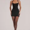 Tula Mid Rise Bodycon Ultra-Mini-Röck mit Schlitz in Schwarz Tula Mid Rise Bodycon Ultra-Mini-Röck mit Schlitz in Schwarz