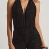 Tulay Devoré-Jumpsuit mit Neckholder und offenem Rücken in Schwarz Tulay Devoré-Jumpsuit mit Neckholder und offenem Rücken in Schwarz