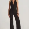 Tulay Devoré-Jumpsuit mit Neckholder und offenem Rücken in Schwarz Tulay Devoré-Jumpsuit mit Neckholder und offenem Rücken in Schwarz