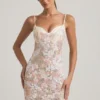 Velena verziertes, figurbetontes Minikleid mit Träger in Elfenbein Velena verziertes, figurbetontes Minikleid mit Träger in Elfenbein