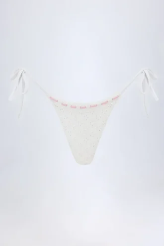 Vernazza Bikinihosen mit seitlichen Bändern und Broderie Anglaise in Weiß Vernazza Bikinihosen mit seitlichen Bändern und Broderie Anglaise in Weiß