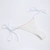 Vernazza Bikinihosen mit seitlichen Bändern und Broderie Anglaise in Weiß Vernazza Bikinihosen mit seitlichen Bändern und Broderie Anglaise in Weiß