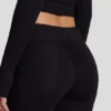 Vevina Modal-Hose mit mittlerer Leibhöhe und ausgestelltem Bein in Schwarz Vevina Modal-Hose mit mittlerer Leibhöhe und ausgestelltem Bein in Schwarz
