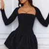 Viola Langarm-Minikleid mit ausgestellter Säume in Schwarz Viola Langarm-Minikleid mit ausgestellter Säume in Schwarz