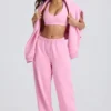 Weiche Jogginghose aus Baumwolljersey mit mittlerer Leibhöhe und weitem Bein in Babyrosa Weiche Jogginghose aus Baumwolljersey mit mittlerer Leibhöhe und weitem Bein in Babyrosa