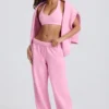 Weiche Jogginghose aus Baumwolljersey mit mittlerer Leibhöhe und weitem Bein in Babyrosa Weiche Jogginghose aus Baumwolljersey mit mittlerer Leibhöhe und weitem Bein in Babyrosa