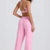 Weiche Jogginghose aus Baumwolljersey mit mittlerer Leibhöhe und weitem Bein in Babyrosa Weiche Jogginghose aus Baumwolljersey mit mittlerer Leibhöhe und weitem Bein in Babyrosa