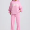 Weiche Jogginghose aus Baumwolljersey mit mittlerer Leibhöhe und weitem Bein in Babyrosa Weiche Jogginghose aus Baumwolljersey mit mittlerer Leibhöhe und weitem Bein in Babyrosa