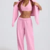 Weiche Jogginghose aus Baumwolljersey mit mittlerer Leibhöhe und weitem Bein in Babyrosa Weiche Jogginghose aus Baumwolljersey mit mittlerer Leibhöhe und weitem Bein in Babyrosa