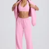 Weiche Jogginghose aus Baumwolljersey mit mittlerer Leibhöhe und weitem Bein in Babyrosa Weiche Jogginghose aus Baumwolljersey mit mittlerer Leibhöhe und weitem Bein in Babyrosa