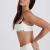 Weicher Active-Sport-BH mit verdrehten Trägern in Elfenbein Weicher Active-Sport-BH mit verdrehten Trägern in Elfenbein