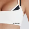 Weicher Active-Sport-BH mit verdrehten Trägern in Elfenbein Weicher Active-Sport-BH mit verdrehten Trägern in Elfenbein