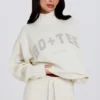Weicher Oversize-Pullover aus Strick in Elfenbein Weicher Oversize-Pullover aus Strick in Elfenbein