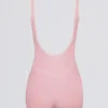 Weicher, rückenfreier Kontrast-Unitard aus Active-Material in Puderrosa Weicher, rückenfreier Kontrast-Unitard aus Active-Material in Puderrosa
