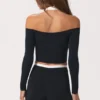 Weiches Jersey-Oberteil mit schulterfreiem Ausschnitt in Schwarz Weiches Jersey-Oberteil mit schulterfreiem Ausschnitt in Schwarz