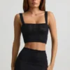 Yolanda Pointelle-Strick-Crop-Oberteil in Schwarz