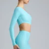 Zanab Metallic-Minikleid mit Cut-outs und einer Schulter in Eisblau Zanab Metallic-Minikleid mit Cut-outs und einer Schulter in Eisblau