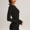 Ziva Modal-Bodys mit Rundhalsausschnitt und langen Ärmeln in Schwarz Ziva Modal-Bodys mit Rundhalsausschnitt und langen Ärmeln in Schwarz