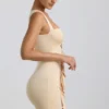 Zivanka Slinky Jersey Cut-Out Rüschen-Minikleid in Buttercream Zivanka Slinky Jersey Cut-Out Rüschen-Minikleid in Buttercream
